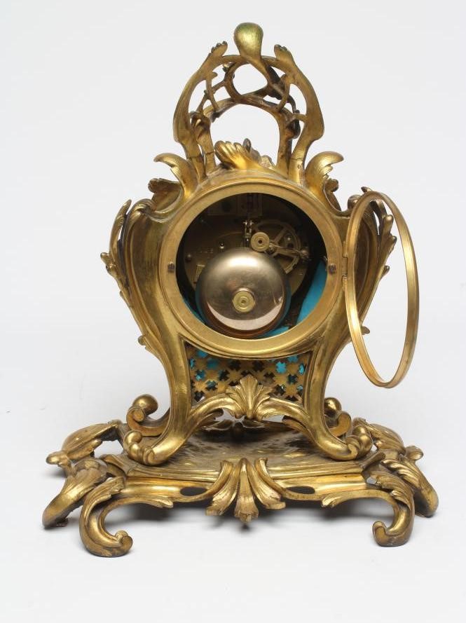 A FRENCH GILT CASED MANTEL CLOCK Image