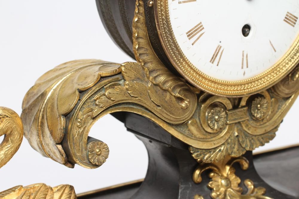 A FRENCH GILT AND PATINATED BRONZE MANTEL CLOCK BY BREGUET Image