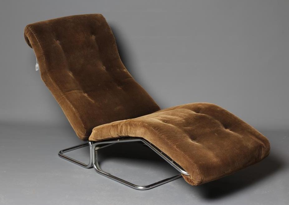 A RETRO CHROME FRAMED LOUNGER with loose cushion in a pale brown corduroy covering Image