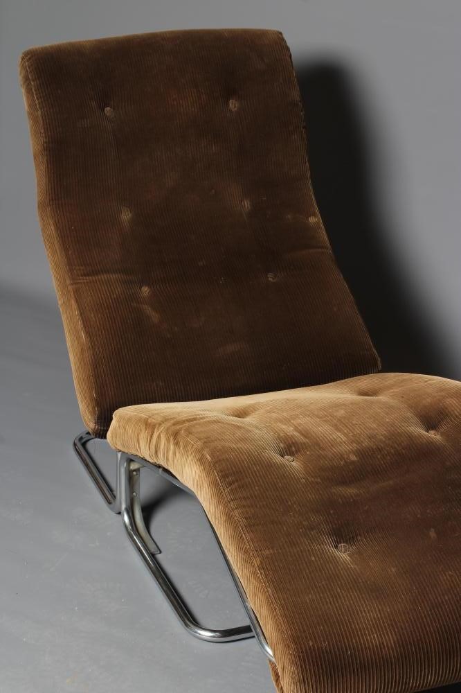A RETRO CHROME FRAMED LOUNGER with loose cushion in a pale brown corduroy covering Image