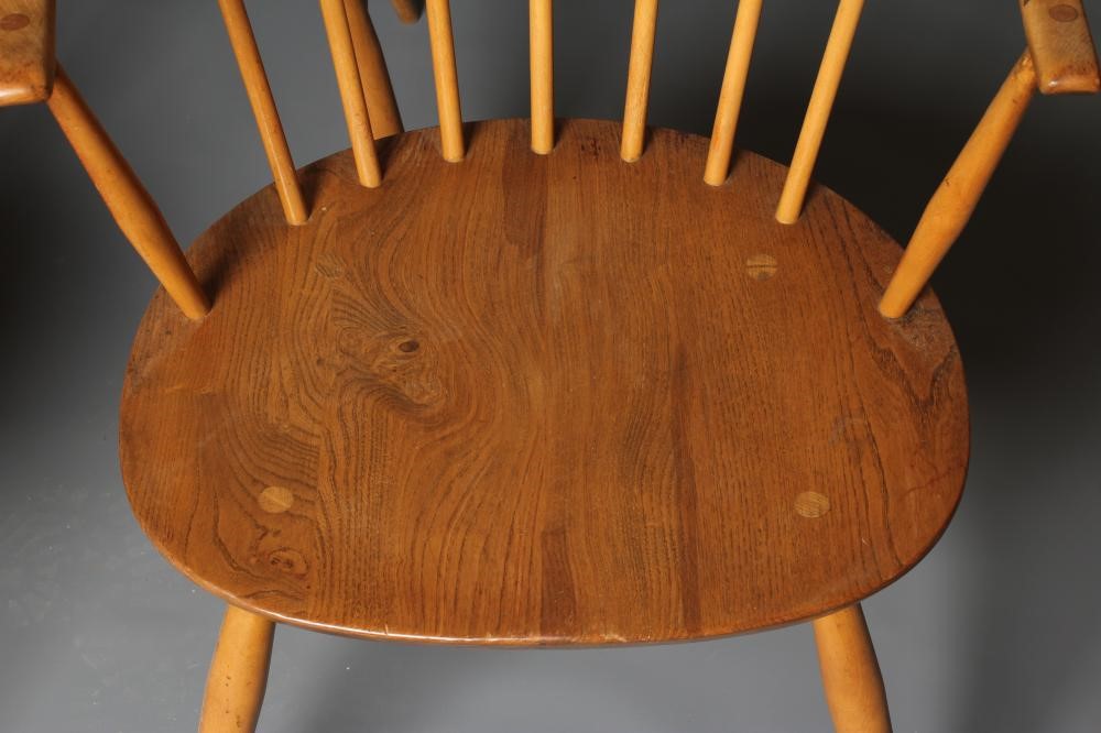 A SET OF FOUR ERCOL MODEL 449A CHAIRS, in blond beech and elm with cow horn arms, 21 3/4" x 14 3/4" Image