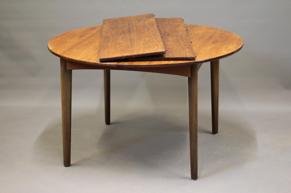 AN H P HANSEN FOR RANDERS ROSEWOOD DINING TABLE of D ended form with two extra leaves Image
