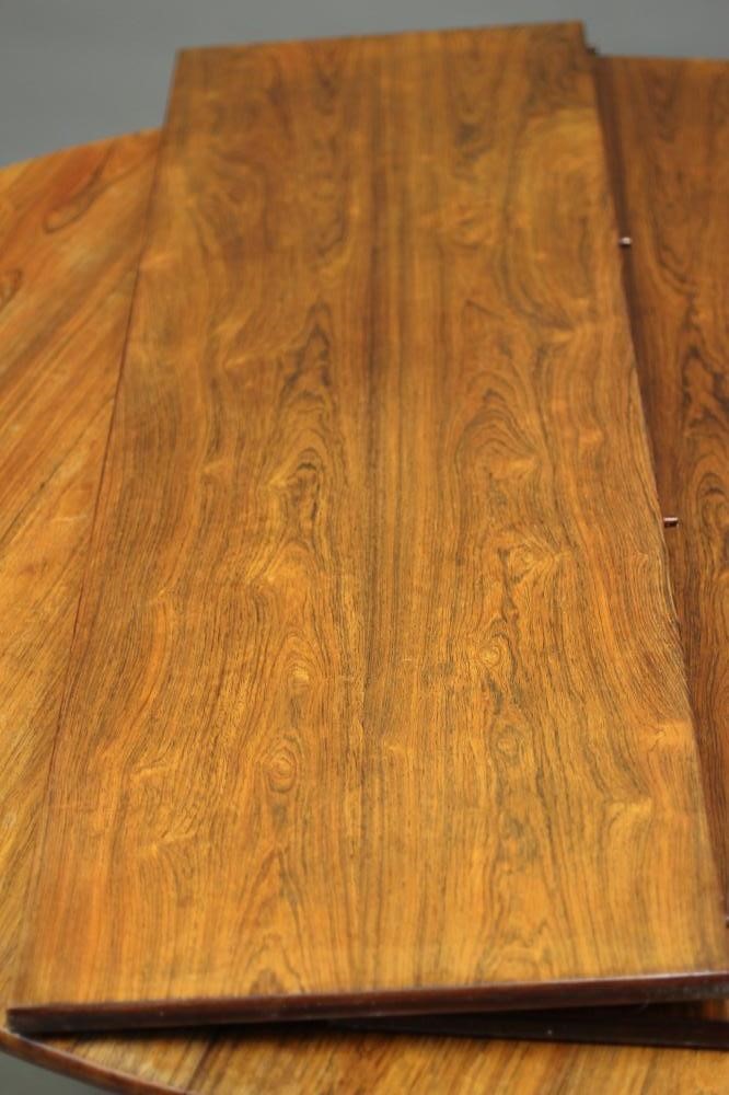 AN H P HANSEN FOR RANDERS ROSEWOOD DINING TABLE of D ended form with two extra leaves Image