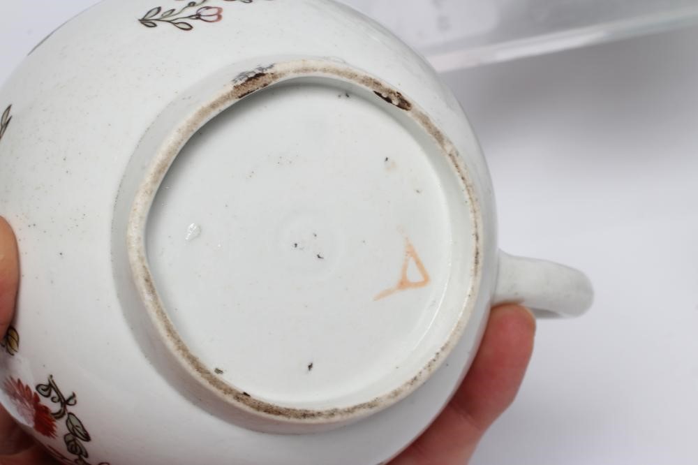 THREE PENNINGTON'S PORCELAIN TEAPOTS AND COVERS, 1780-90, all painted in polychrome enamels with Image