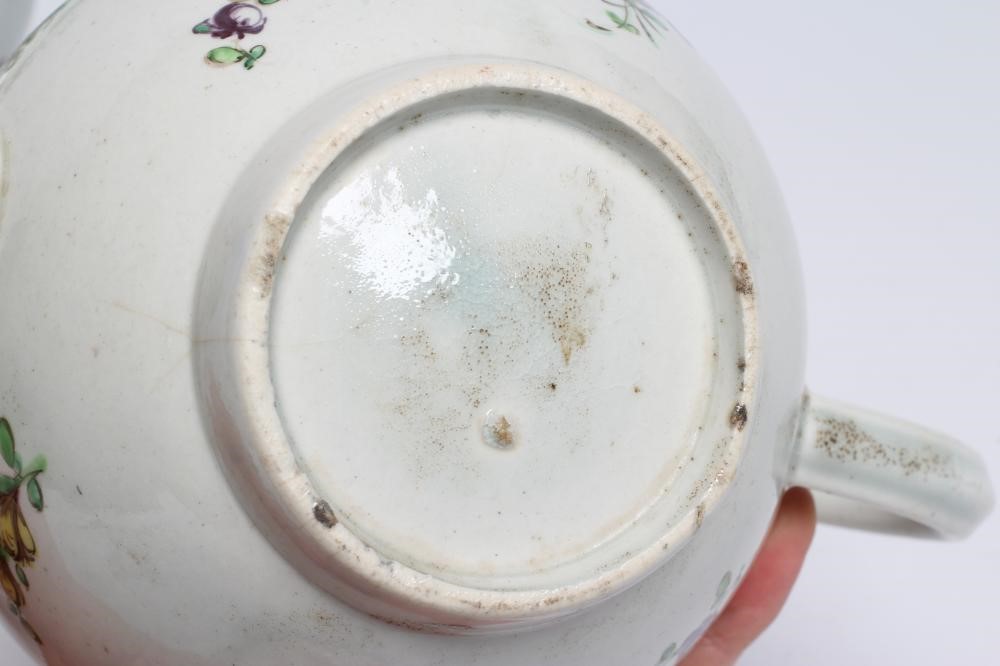 THREE PENNINGTON'S PORCELAIN TEAPOTS AND COVERS, 1780-90, all painted in polychrome enamels with Image