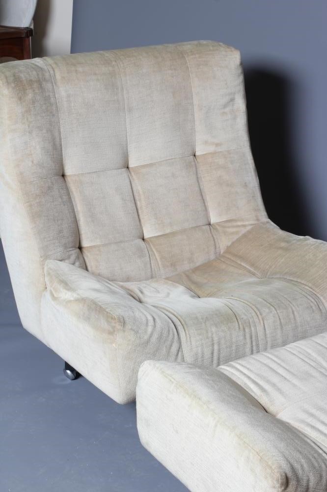 A RETRO SWIVEL LOUNGE CHAIR AND OTTOMAN of open square form button upholstered in champagne dralon Image