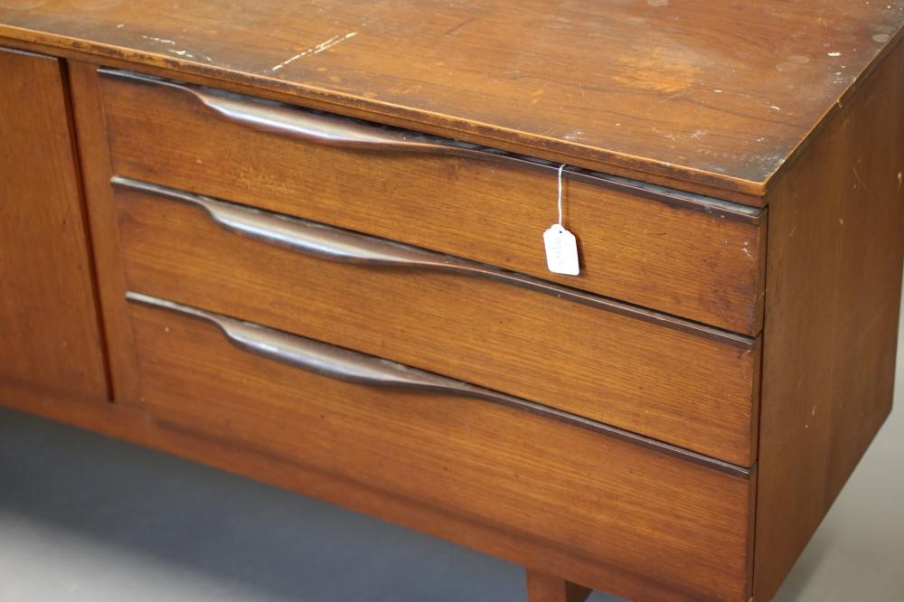 A BEAUTILITY TEAK SIDEBOARD Image