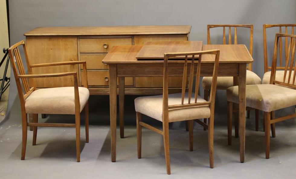 A GORDON RUSSELL WALNUT DINING SUITE Image