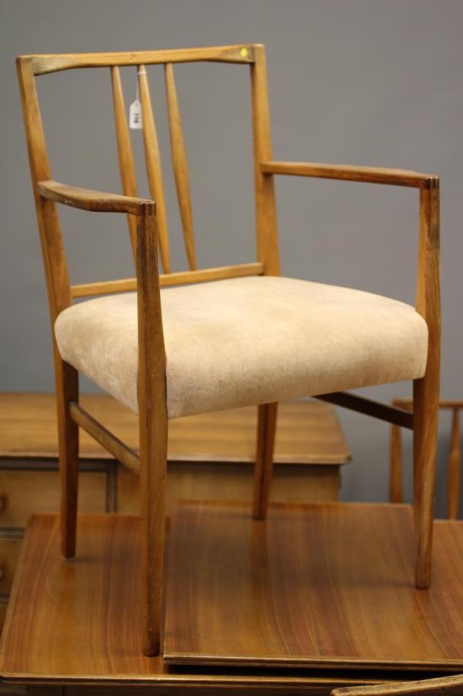 A GORDON RUSSELL WALNUT DINING SUITE Image