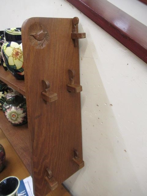 A BOB HUNTER (THIRLBY) OAK WALL PLATE RACK, comprising two shelves tenoned into tapering ends, Image
