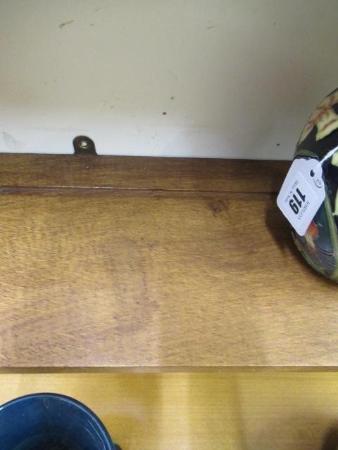 A BOB HUNTER (THIRLBY) OAK WALL PLATE RACK, comprising two shelves tenoned into tapering ends, Image