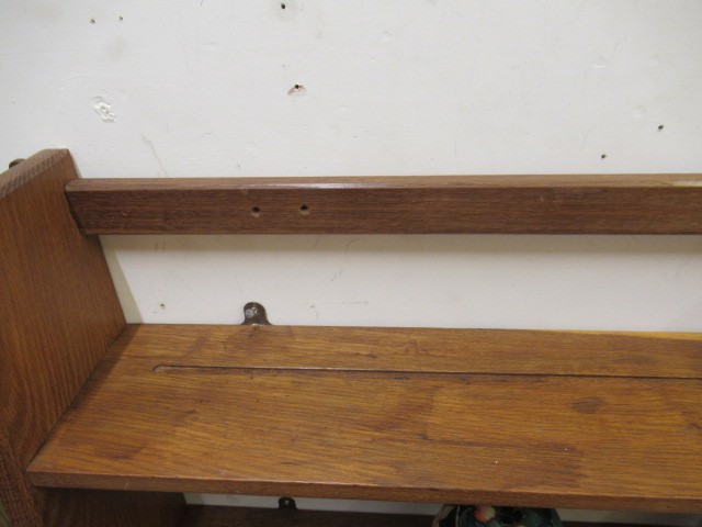 A BOB HUNTER (THIRLBY) OAK WALL PLATE RACK, comprising two shelves tenoned into tapering ends, Image