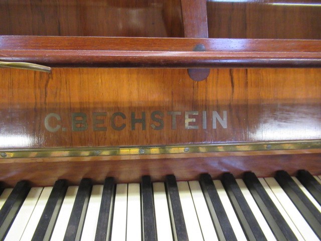 AN EDWARDIAN ROSEWOOD CASED BECHSTEIN UPRIGHT Image