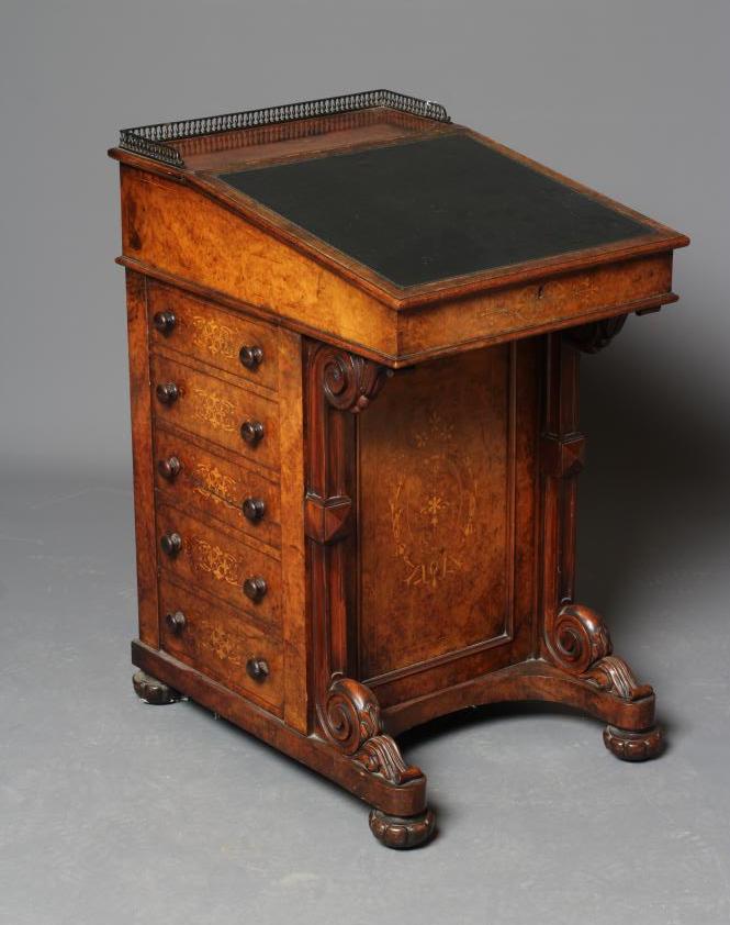AN EARLY VICTORIAN BURR WALNUT AND MARQUETRY DAVENPORT with gilt metal gallery surmount Image