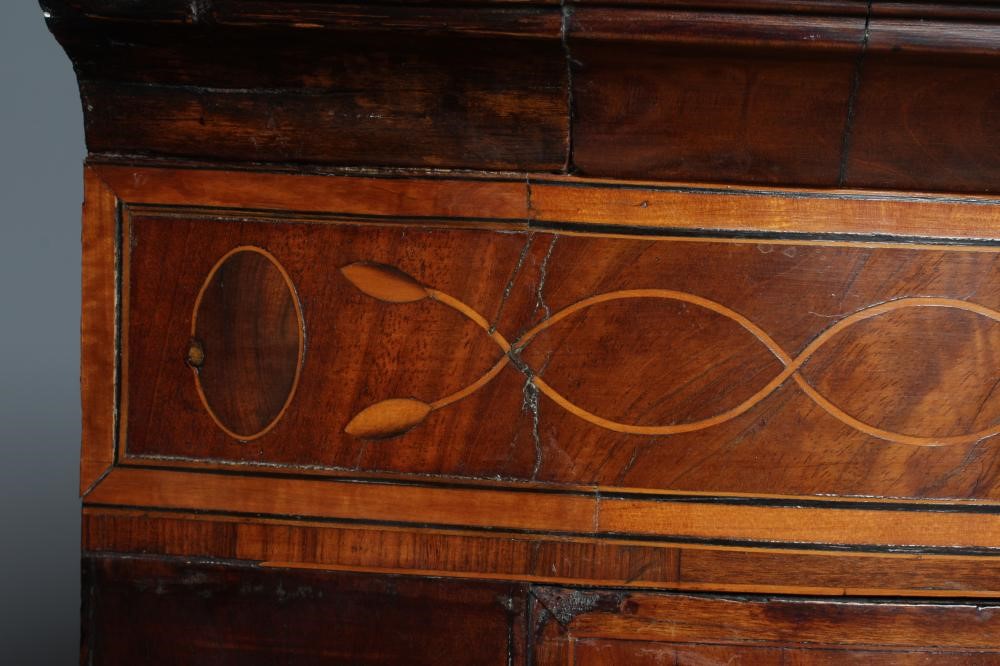 A GEORGE III MAHOGANY CORNER CUPBOARD Image