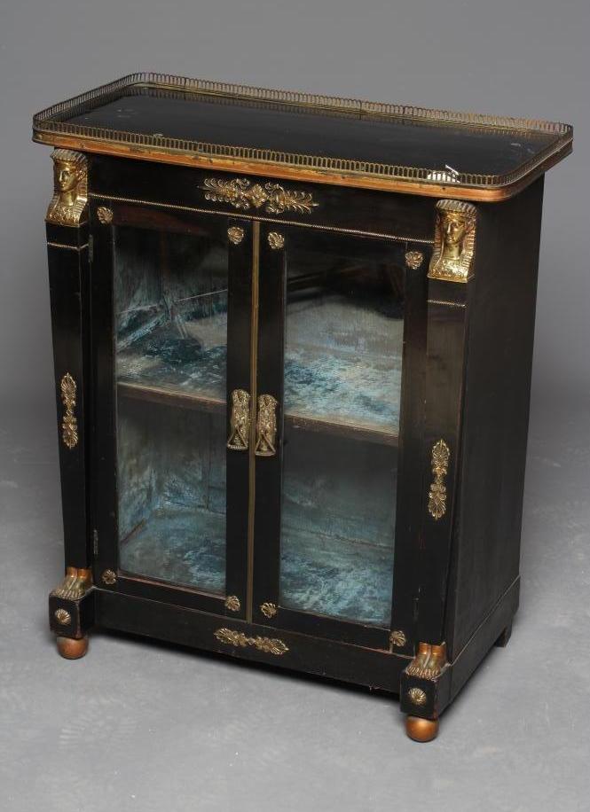 AN EGYPTIAN REVIVAL EBONISED PIER CABINET Image