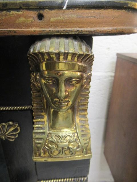 AN EGYPTIAN REVIVAL EBONISED PIER CABINET Image