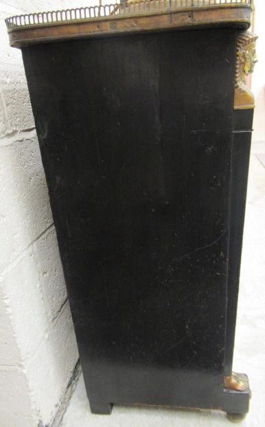 AN EGYPTIAN REVIVAL EBONISED PIER CABINET Image