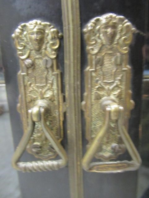 AN EGYPTIAN REVIVAL EBONISED PIER CABINET Image