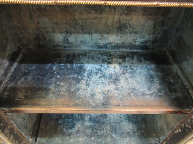 AN EGYPTIAN REVIVAL EBONISED PIER CABINET Image