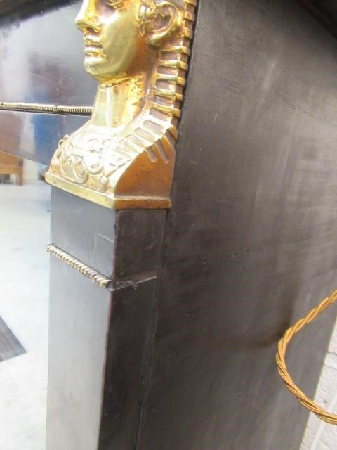 AN EGYPTIAN REVIVAL EBONISED PIER CABINET Image