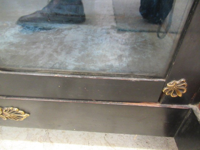 AN EGYPTIAN REVIVAL EBONISED PIER CABINET Image