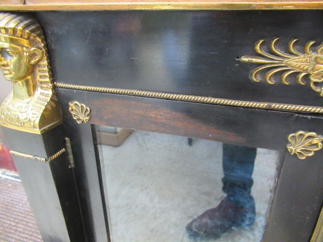 AN EGYPTIAN REVIVAL EBONISED PIER CABINET Image
