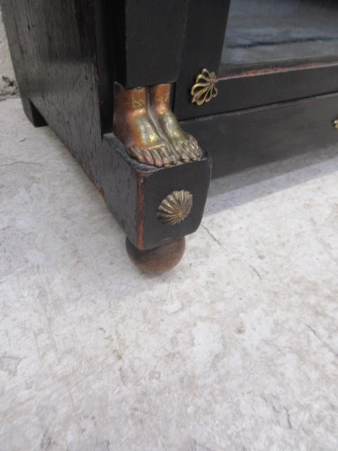 AN EGYPTIAN REVIVAL EBONISED PIER CABINET Image
