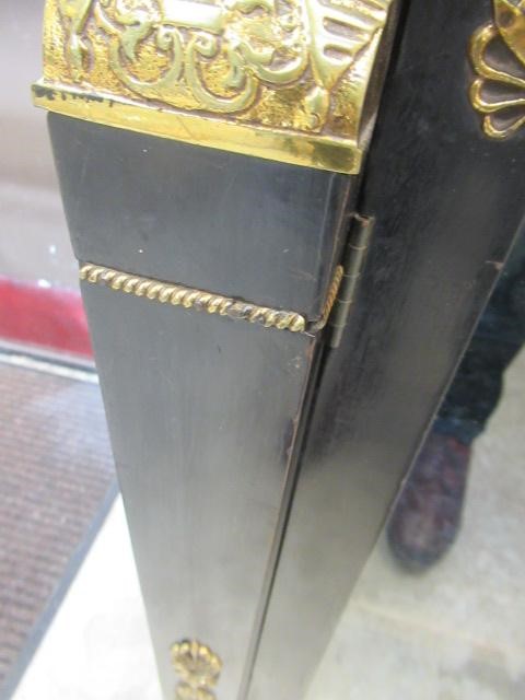 AN EGYPTIAN REVIVAL EBONISED PIER CABINET Image