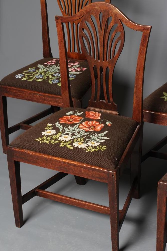 A SET OF FOUR GEORGIAN MAHOGANY DINING CHAIRS of Hepplewhite type Image