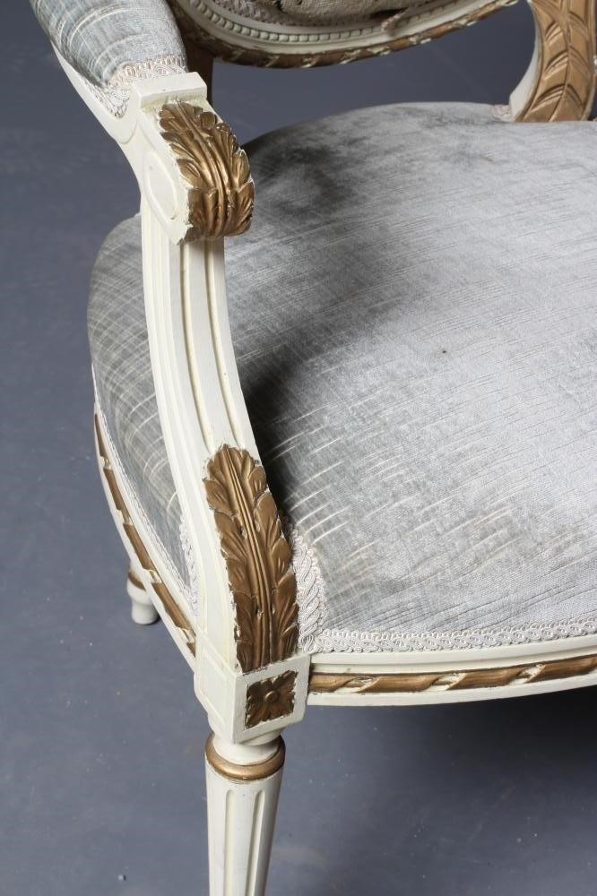 A PAINTED AND PARCEL GILT FAUTEIL Image