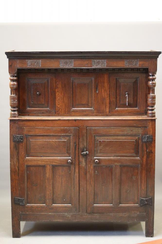 A JOINED OAK PRESS CUPBOARD Image