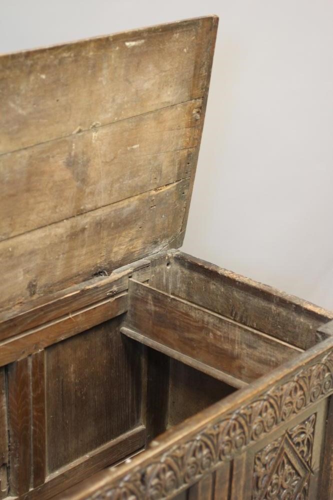 AN OAK PANELLED COFFER Image
