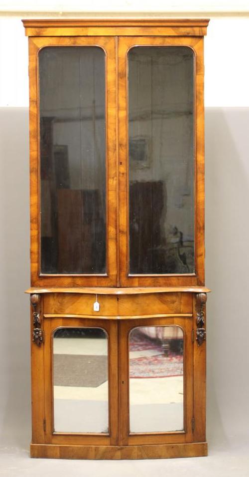 A VICTORIAN WALNUT TWO STAGE BOOKCASE Image