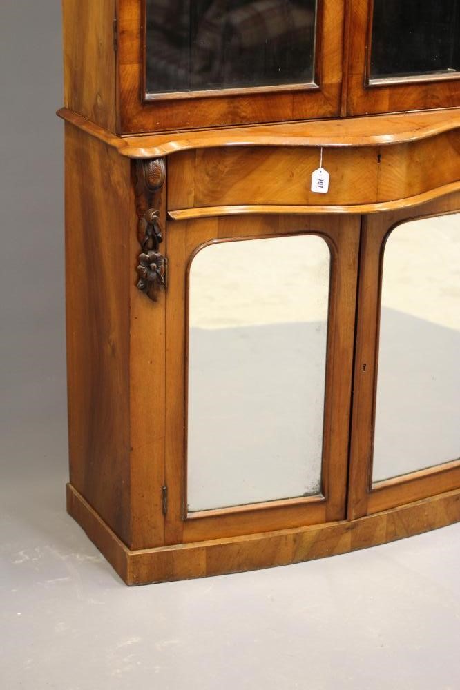 A VICTORIAN WALNUT TWO STAGE BOOKCASE Image