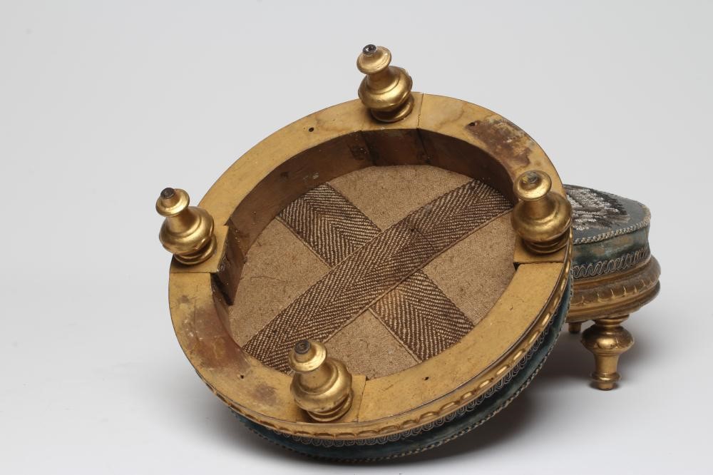 A PAIR OF EARLY VICTORIAN GILT WOOD FOOT STOOLS, of circular form upholstered in floral beadwork and Image