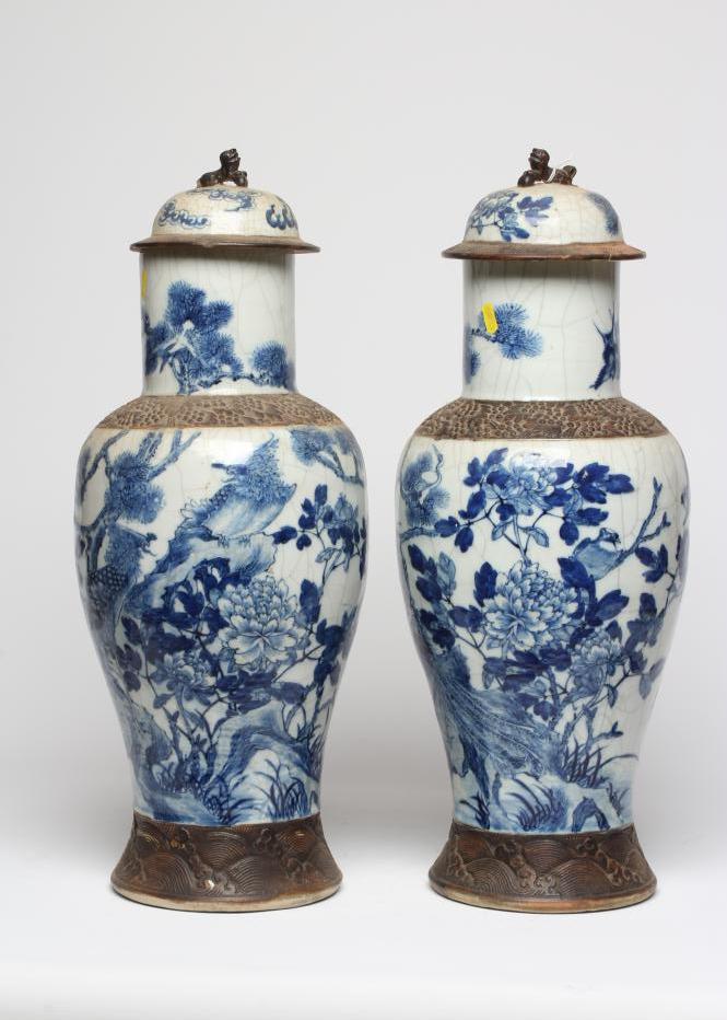 A PAIR OF CHINESE CRACKLE GLAZE VASES AND COVERS of inverted baluster form painted in underglaze Image