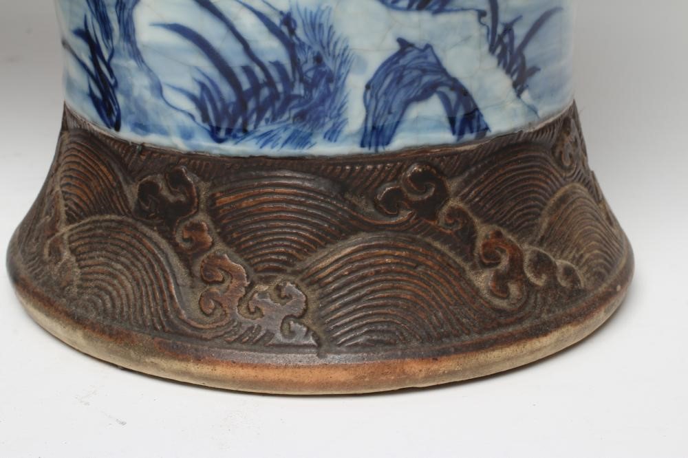 A PAIR OF CHINESE CRACKLE GLAZE VASES AND COVERS of inverted baluster form painted in underglaze Image