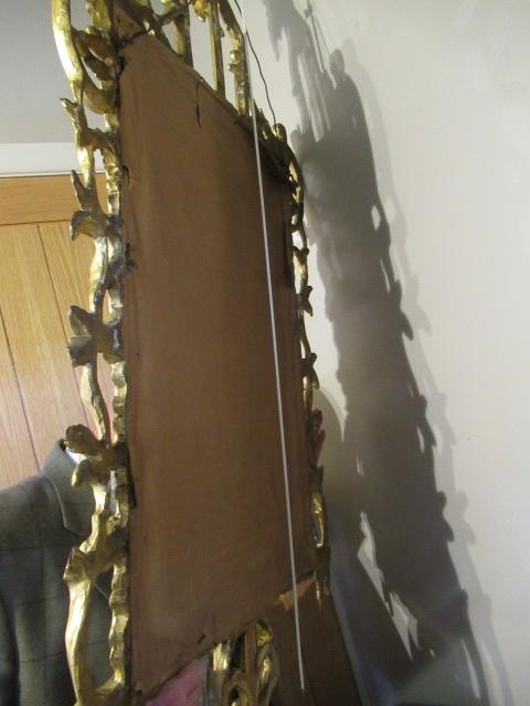 A GEORGIAN CARVED AND GILTWOOD PIER GLASS Image