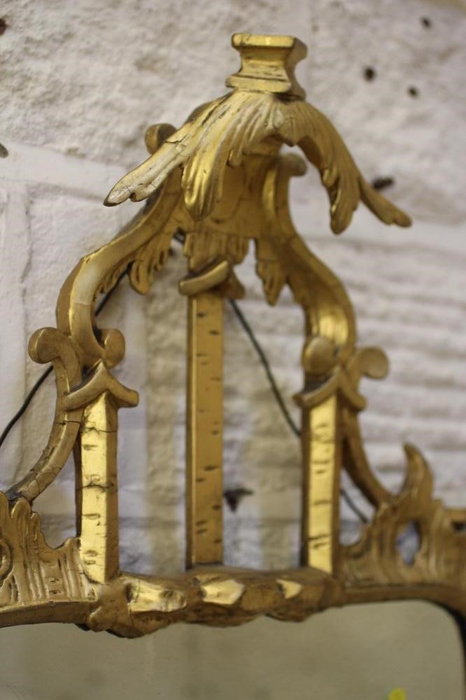 A GEORGIAN CARVED AND GILTWOOD PIER GLASS Image