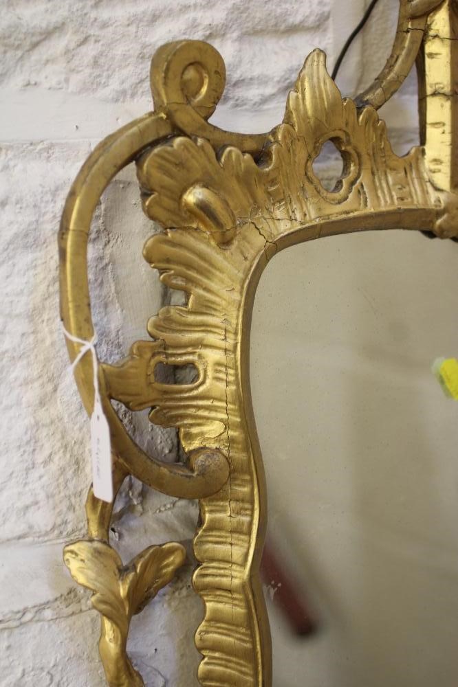 A GEORGIAN CARVED AND GILTWOOD PIER GLASS Image