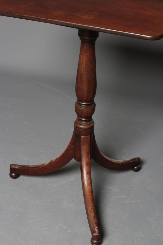 A REGENCY MAHOGANY WINE TABLE, early 19th century, the rounded oblong top on turned vase stem, on Image