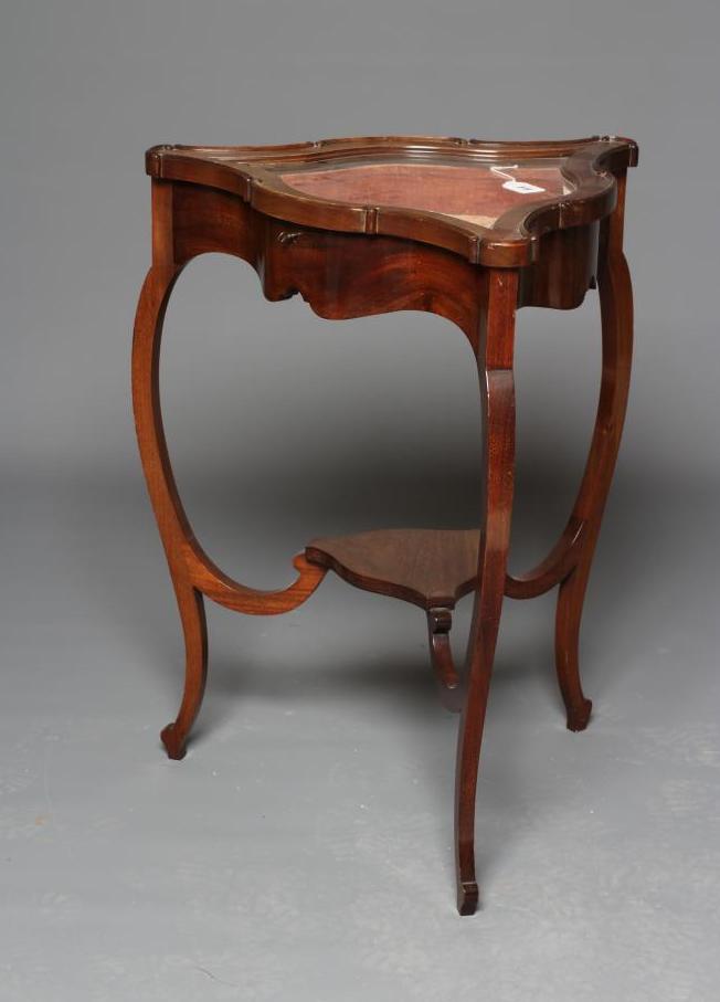 A MAHOGANY BIJOUTERIE TABLE Image