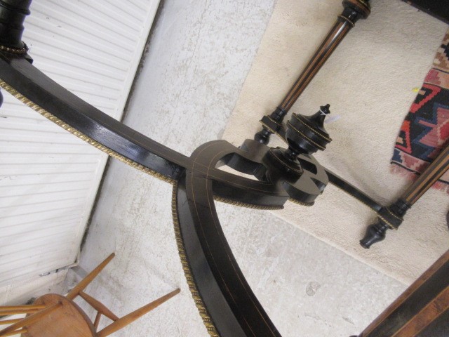 A VICTORIAN EBONISED AND AMBOYNA LIBRARY TABLE Image