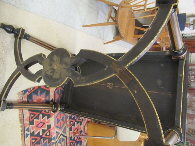 A VICTORIAN EBONISED AND AMBOYNA LIBRARY TABLE Image