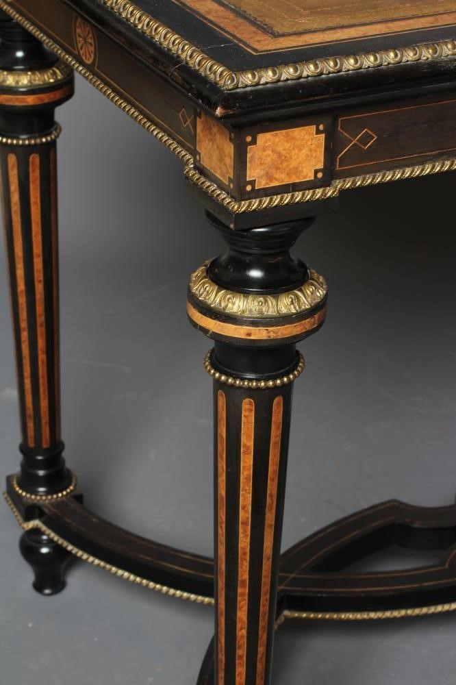 A VICTORIAN EBONISED AND AMBOYNA LIBRARY TABLE Image