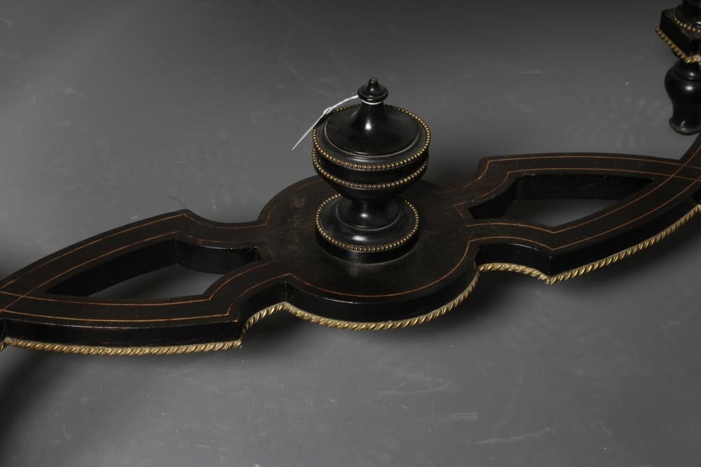 A VICTORIAN EBONISED AND AMBOYNA LIBRARY TABLE Image