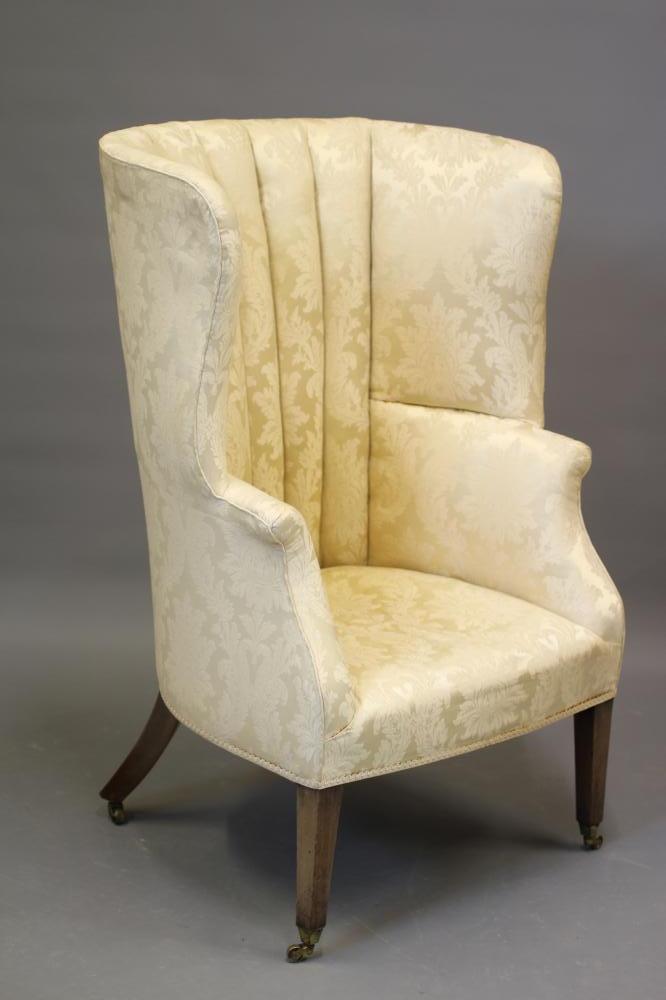 A LATE VICTORIAN MAHOGANY BARREL BACK ARMCHAIR Image