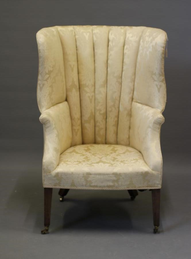 A LATE VICTORIAN MAHOGANY BARREL BACK ARMCHAIR Image