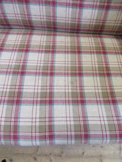 A VICTORIAN WALNUT FRAMED CHESTERFIELD SOFA, upholstered in wool tartan, raised on turned legs with Image